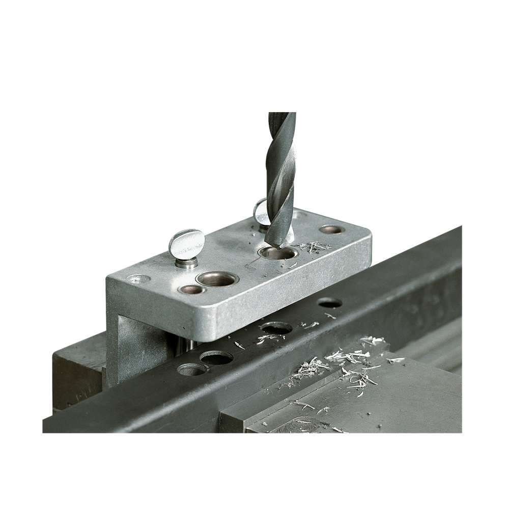 Drilling jig for swing gate locks