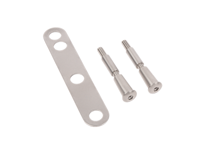 Guide plate for a smooth guidance of the bolts of the surface mounted lock