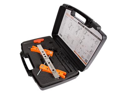 Tool case with drilling jig for surface mounted locks and corresponding keeps